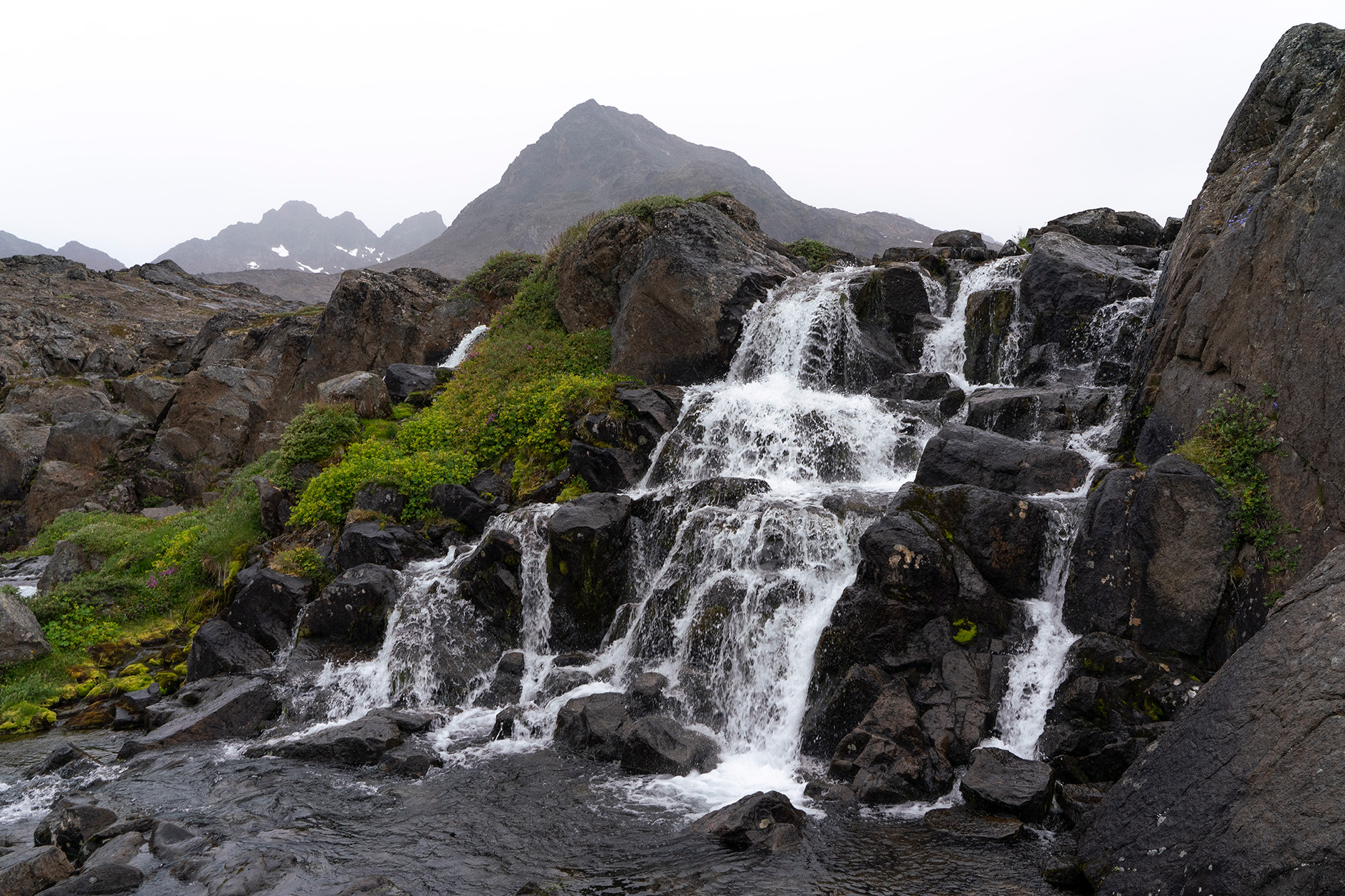 moss green waterfalls glacial water greenland arctic landscapes